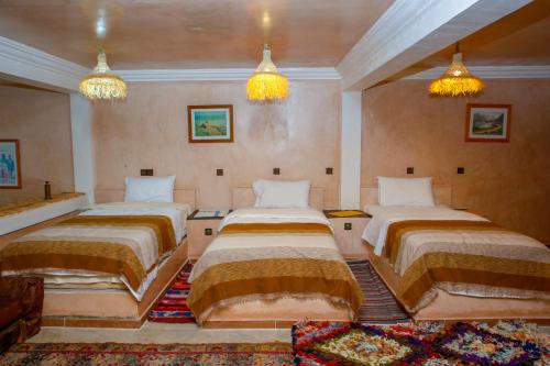 Una cama o camas en una habitación de Riad Gabsi Dades