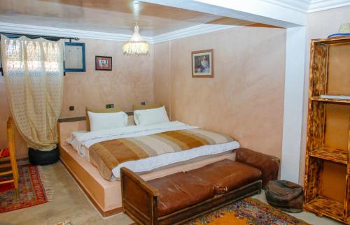 Una cama o camas en una habitación de Riad Gabsi Dades