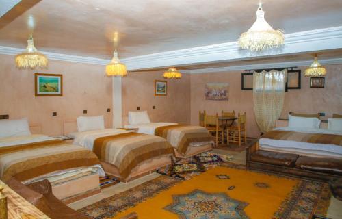 Una cama o camas en una habitación de Riad Gabsi Dades