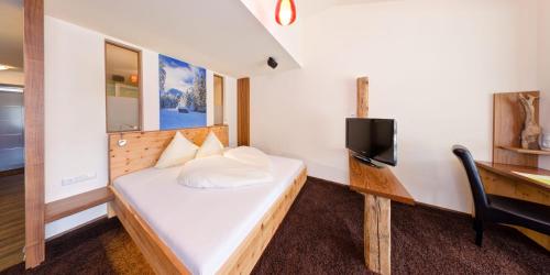 A bed or beds in a room at Appartementhaus Wetterloch