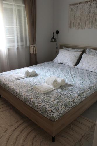 Ένα ή περισσότερα κρεβάτια σε δωμάτιο στο Gaby Family House Concept
