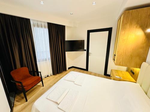 Katil atau katil-katil dalam bilik di Rose Point Residence