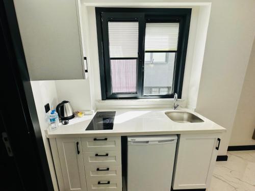 Dapur atau dapur kecil di Rose Point Residence