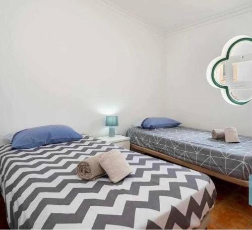 Postel nebo postele na pokoji v ubytování Casa Vila Sul AE