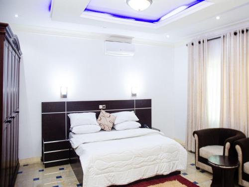 Postel nebo postele na pokoji v ubytování Beach Sand Hotel & Resort, Cotonou