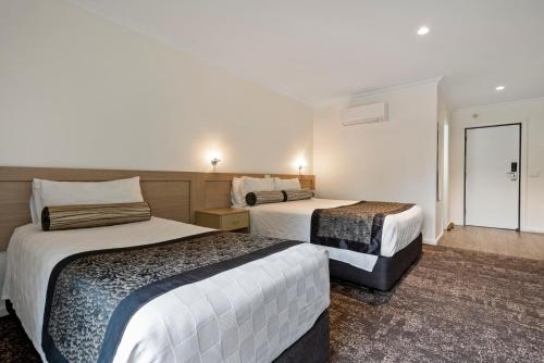 Postel nebo postele na pokoji v ubytování Springs Mittagong