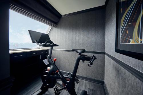 a bike in a room with a window at Loews Nashville Hotel at Vanderbilt Plaza in Nashville
