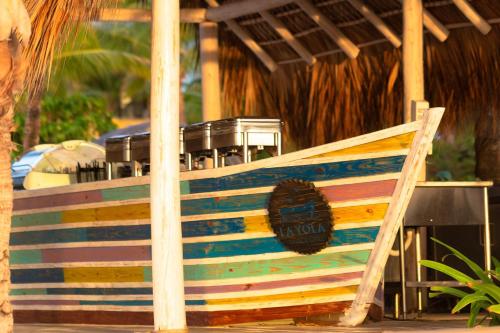 a colorful boat sitting in front of a building at Sanctuary Cap Cana, a Luxury Collection Resort, Dominican Republic, Adult All-Inclusive in Punta Cana