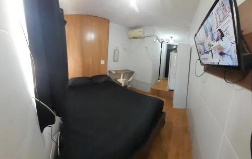 Et tv og/eller underholdning på Hostel Residencial Carvalho