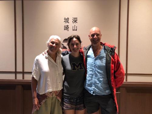 a group of three people posing for a picture at Shinzan Kinosaki in Toyooka
