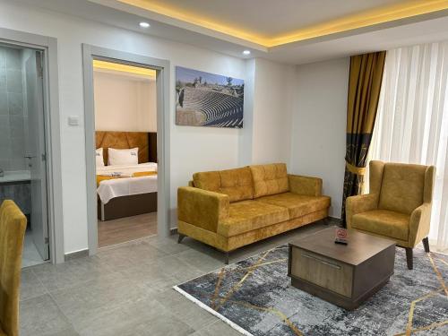 Кровать или кровати в номере Nurel Shark Residence