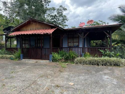 a small house with a red roof at Quinta Herrera in Ánimas