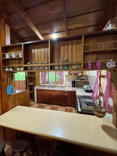 a kitchen with a white counter top in a room at Quinta Herrera in Ánimas