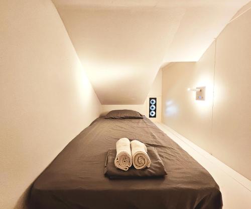 Cama o camas de una habitación en Seasun Hostel