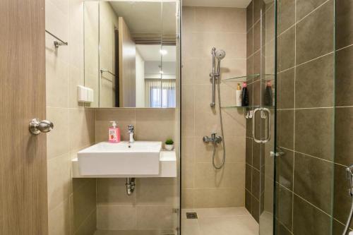 a bathroom with a sink and a shower at 1br-Stunning View-Hana Apart in Ho Chi Minh City