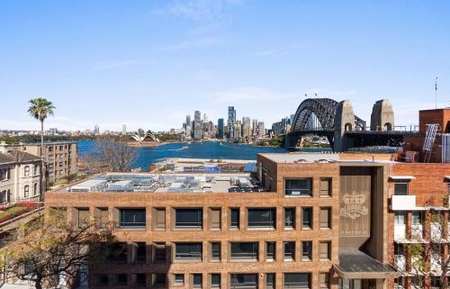 a view of the city from the roof of a building at Dream Views of Sydney CBD in Sydney