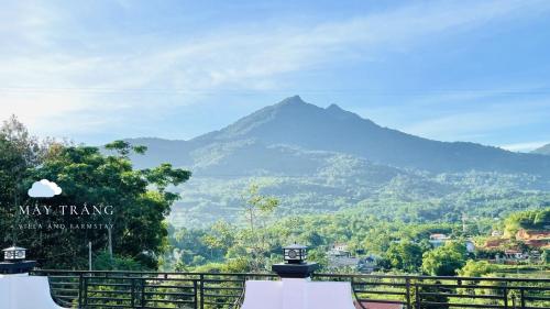a view of a mountain in the distance at Mây Trắng Villa and FarmStay in Ba Vì