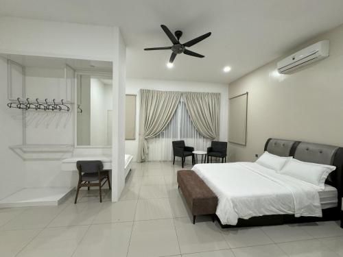 a bedroom with a bed and a tub and a table at Hillside House, Ipoh Garden, Max 9 pax, Hillview, No parties & events, No pets in Ipoh