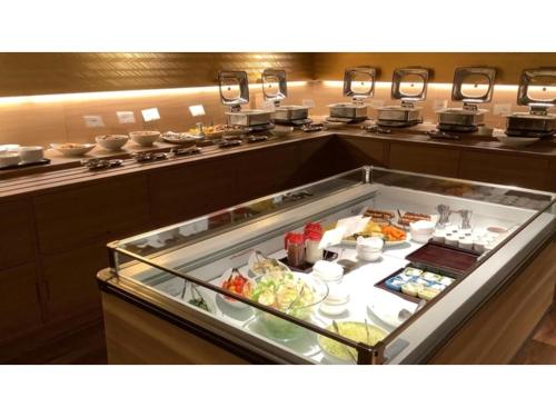 a buffet in a restaurant with a lot of food at Kutsurogi no Yado Juraku - Vacation STAY 03504v in Tobe