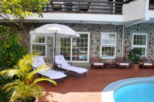 
The swimming pool at or close to Marigot Palms Luxury Caribbean Apartment Suites

