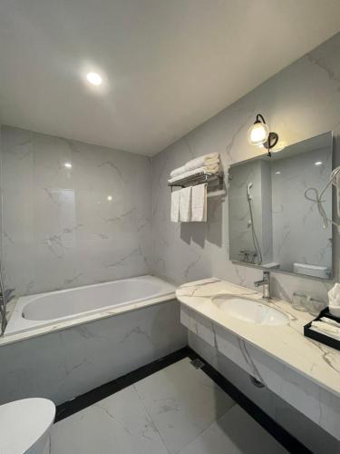 Ванная комната в Lotus Hotel & Apartment