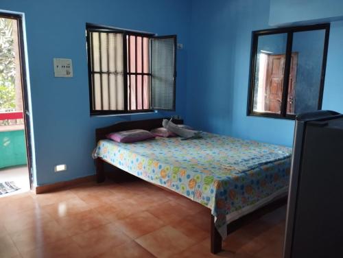 Postel nebo postele na pokoji v ubytování Om Ganesh Naik Guest House