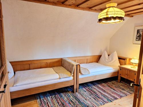 Postel nebo postele na pokoji v ubytování Ferienhütte Panoramablick