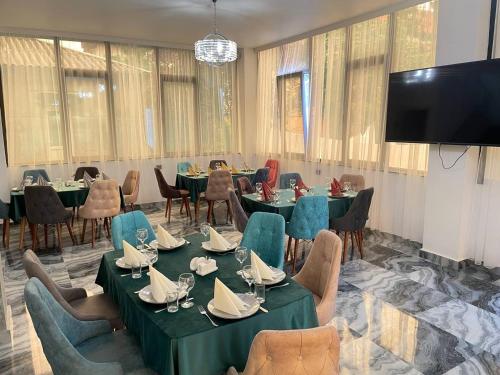 TV a/nebo společenská místnost v ubytování Hotel Chipo 4