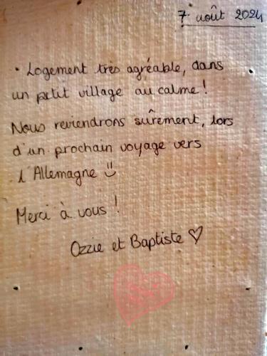 a page of a letter with a heart on it at Appartement, Nature, Relaxation et Demi-Pension Possible in Crévic