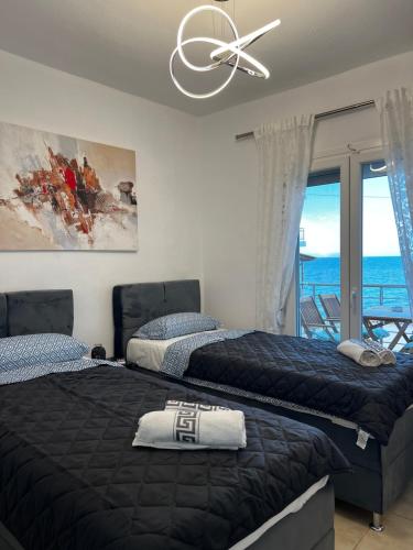 Ένα ή περισσότερα κρεβάτια σε δωμάτιο στο Nissos 1 apartments thassos