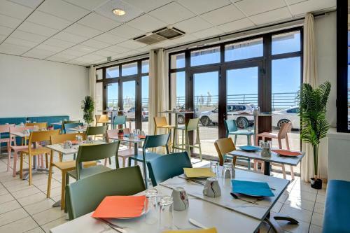 Hotel Camilleにあるレストランまたは飲食店