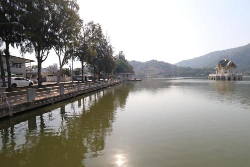 a river with a building on the side of it at Beach House @ Khao Tao in Khao Tao