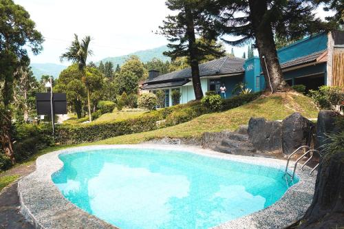 Πισίνα στο ή κοντά στο Villa Airis By The Villas 100