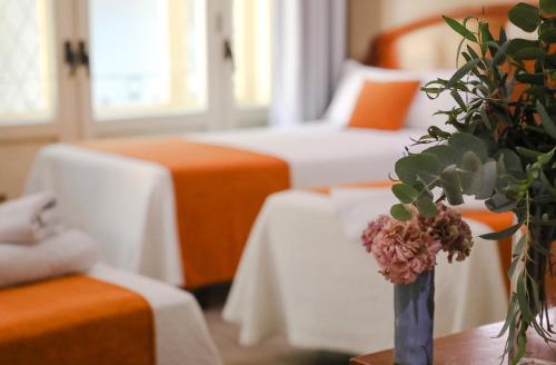 Postel nebo postele na pokoji v ubytování Hostal San Lorenzo