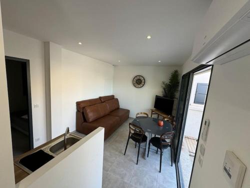 Ruang duduk di Appartement neuf centre du village
