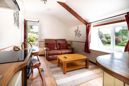 Istumisnurk majutusasutuses Ta Mill Cottages & Lodges - Smithy Cottage