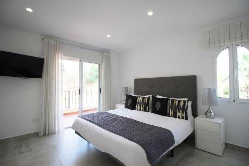 Ένα ή περισσότερα κρεβάτια σε δωμάτιο στο Beautiful Three Bedrooms Los Olivos Penthouse