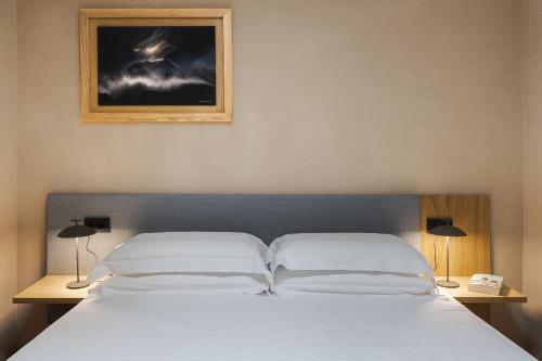 Postel nebo postele na pokoji v ubytování Gebel House