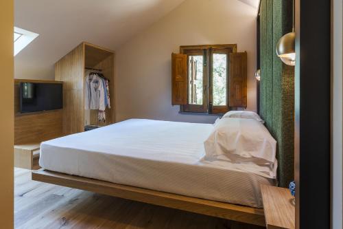 Postel nebo postele na pokoji v ubytování Gebel House