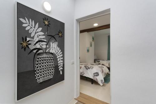 Una cama o camas en una habitación de Los Abuelos 3 Icod