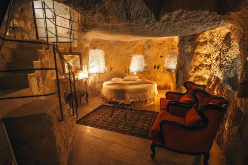 Χώρος καθιστικού στο Saliche Cave Suite