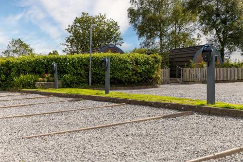 a group of train tracks in a gravel parking lot at The Kellbank in Gosforth