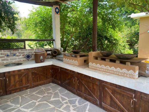 Zahrada ubytování Rustic Home by Farms & Jungle - Entire Cottage