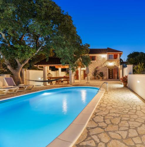 The Grandfather's courtyard villa with heated pool