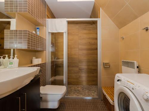 Kúpeľňa v ubytovaní Apartament Egzotyczny Bory