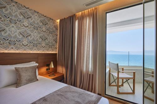Postel nebo postele na pokoji v ubytování VALIS LUXURY Hotel