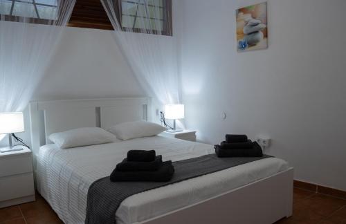 Postel nebo postele na pokoji v ubytování Dream's House