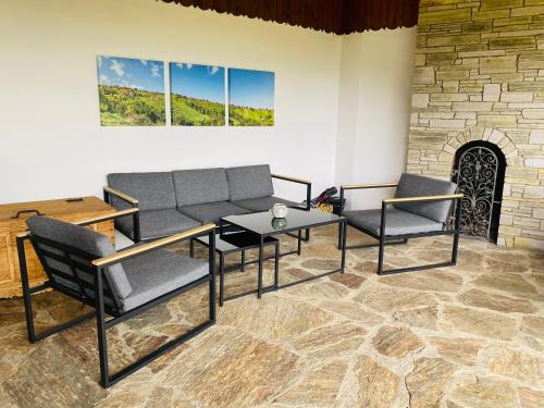 a living room with a table and chairs at Ferienhaus Lemsitz 34 in Lemsitz