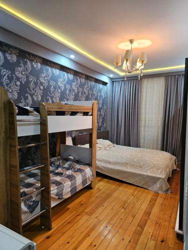 Ένα ή περισσότερα κρεβάτια σε δωμάτιο στο Jade's Apartment