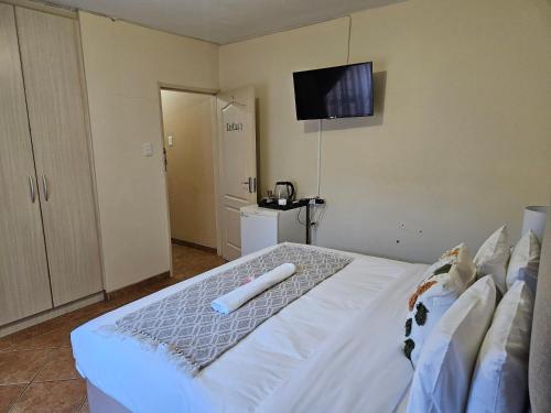 Televisyen dan/atau pusat hiburan di AMM Guesthouse